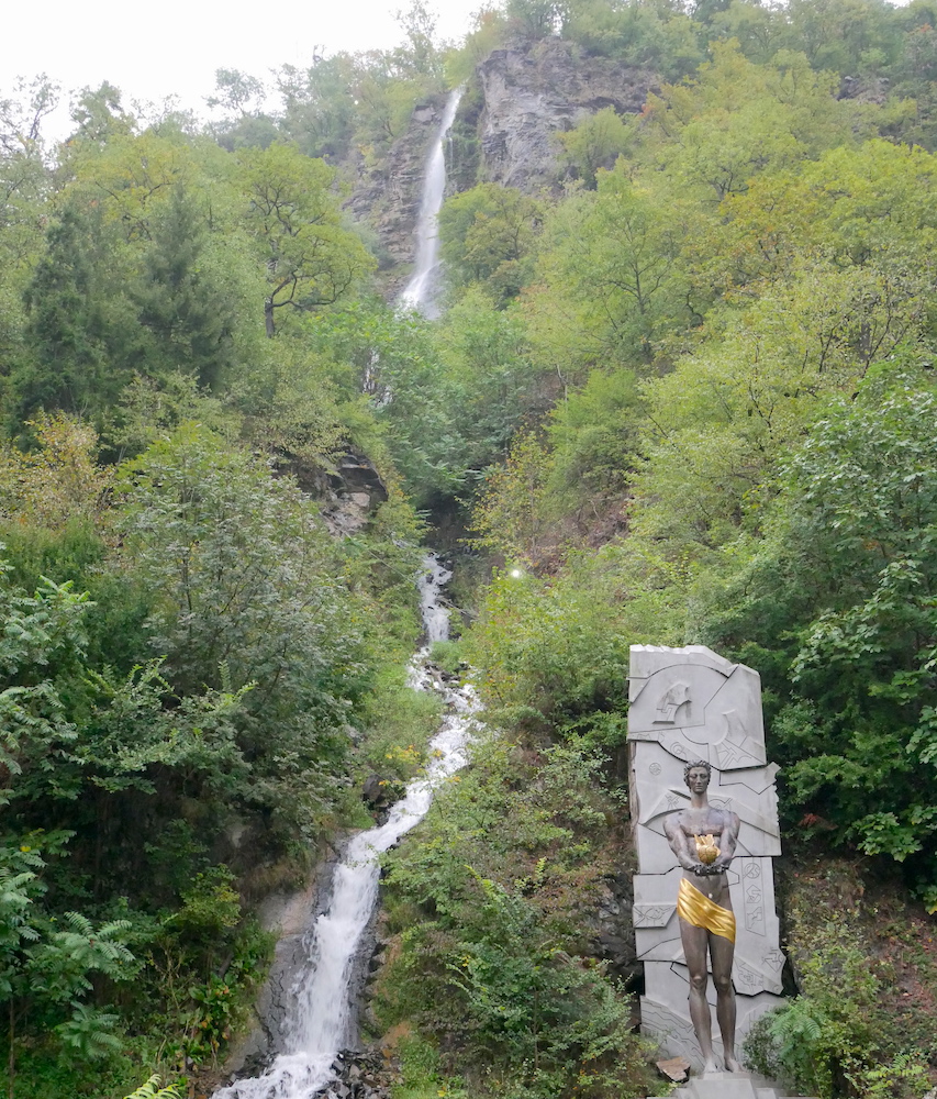 waterfall and statue